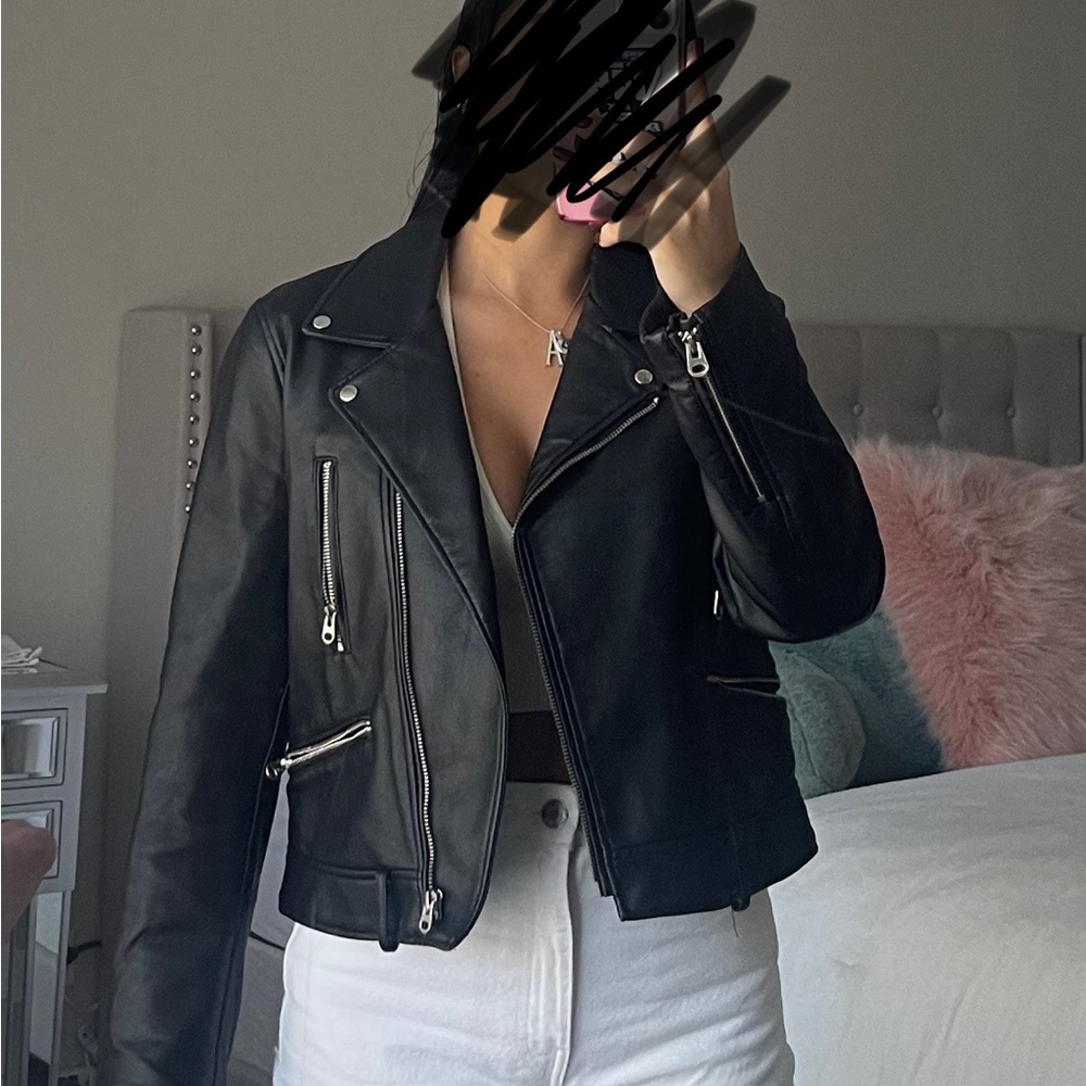 Black faux leather jacket from Zara